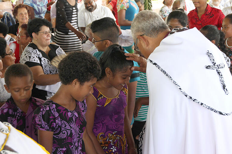 'Suffer not the little children to come unto me' - the bishops blessed dozens of children at the end of the service.