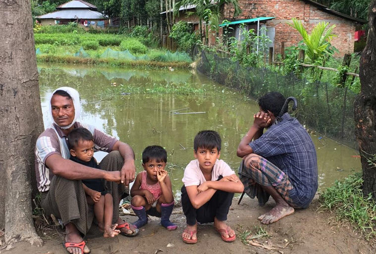 Rohingya men supervise children in one of the flood-stricken areas where aid agencies are working to provide food and shelter. Photo:Christian Aid.