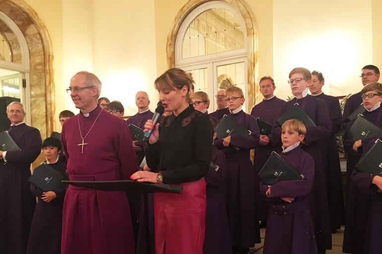 The Archbishop of Canterbury, with Sally Axworthy, the British Ambassador to the Holy See, and the choristers of Canterbury Cathedral.
