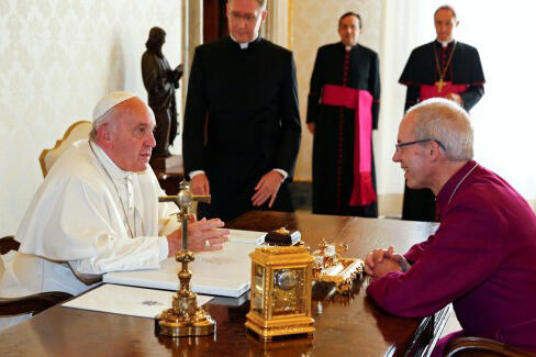 Pope Francis meets Archbishop of Canterbury Justin Welby at the Vatican yesterday.