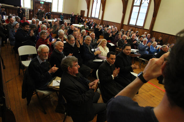 Anglo-Catholic Hui members offer a round of applause to thank the speakers, organisers and St Michael's crew.