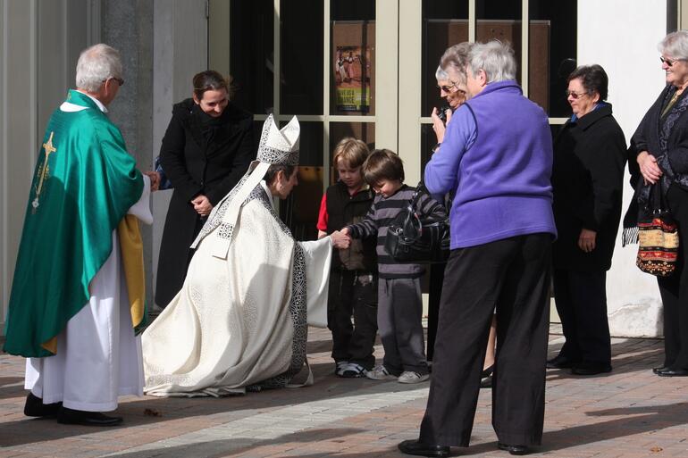 A couple of the younger members of the Holy Trinity Cathedral congregation greet their visitor.