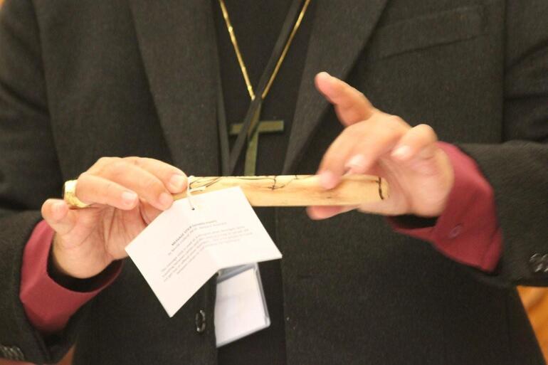 Archbishop Roger Herft wove his address around a reflection on the modern memory stick - and the ancient Aboriginal message stick.