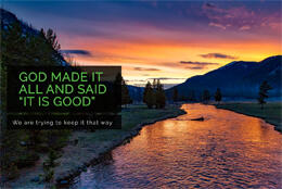 Three women stand smiling and talking in a meeting hall
