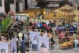 Wellington cathedral interior with palms and many people
