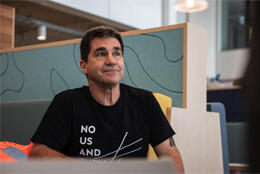 city missioner Murray Edridge sits at a table in Whakamaru - where people flocked to escape flooded homes