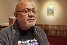 A portrait of grey-haired Tongan theologian the late Jione Havea pictured
