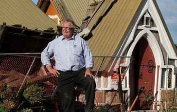 The Rev Neil Struthers contemplates the fate of Lyttelton's Holy Trinity Anglican Church. Photo: Greg Bowker, NZ Herald