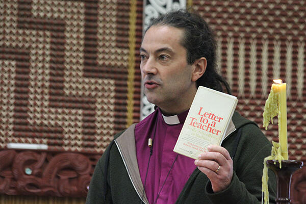 Bishop Justin brandishes the book which rocked the education world - and which has shaped thinking about social class and schools.
