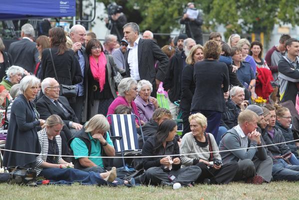 People gather for the memorial service in Latimer Square. Photo: Dean Kozanic/Fairfax NZ