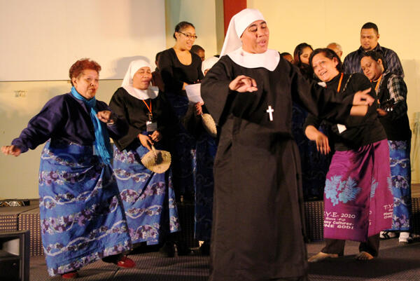 Sr Kalolaine Tuineau, CSN, dances the Lord's Prayer during the Pasefika presentation - supported by Amy Chambers and Kofe Havea . 