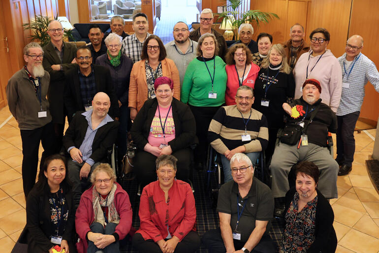 Delegates and presenters at the 2026 Anglican Disability Ministry Summit line up for a group photo.