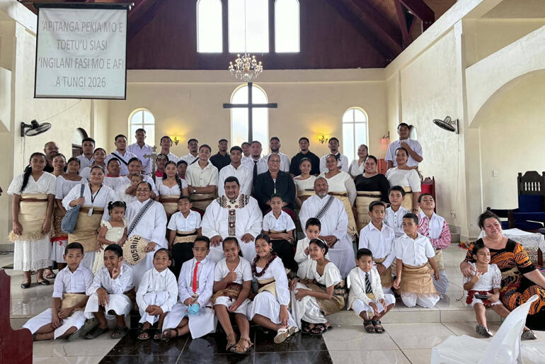 All Saints' Anglican Church in Fasi, Tonga line up in their Easter festival white attire, Easter Sunday 2026.