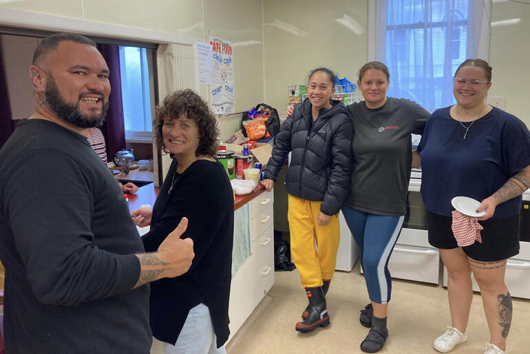 Kitchen volunteers grab a picture at Holy Trinity Dargaville's Civil Defence centre.