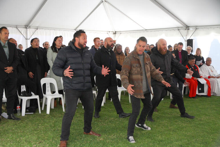 Staff and students greet their new Manukura with a haka.