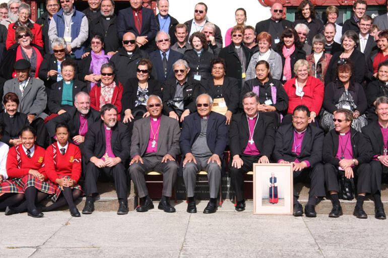 On the steps leading into the wharenui at Poho o Rawiri - with Archbishop Jabez's portrait still prominent.