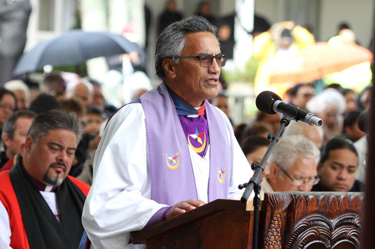 Archbishop Don Tamihere (left) listens as a Rātana Church Apotoro Rehita reads at Turangawaewae marae.