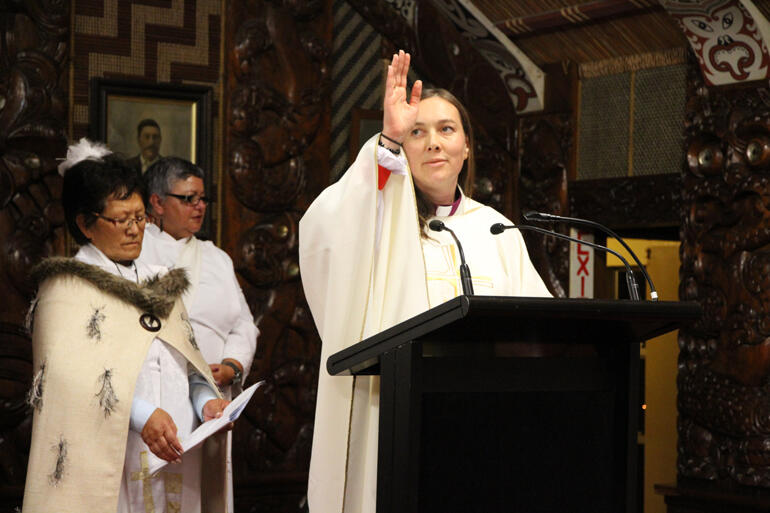 Bishop Eleanor Sanderson gives the blessing. 