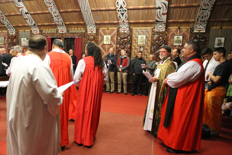 Bishops from across the motu process in to the opening hymn.