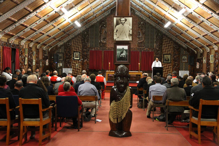  The Rev Mele Prescott leads the prayers of the people inside Te-Ika-Roa-a-Maui wharenui in Waitara. 