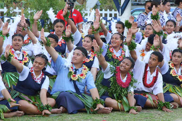 St Andrew's students present a traditional seated dance during the welcome ceremony.