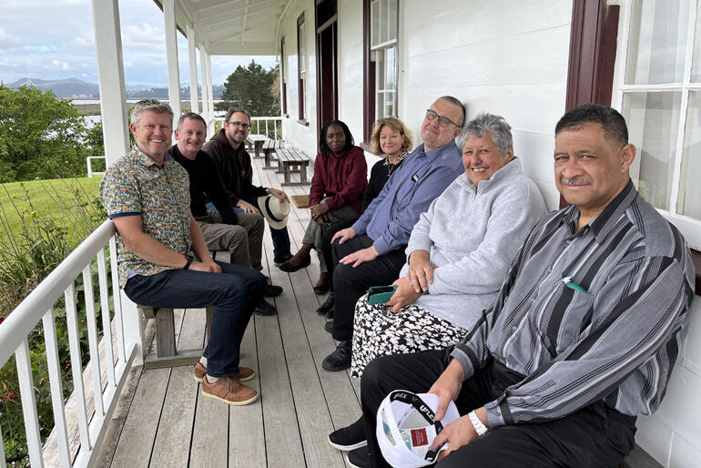 Anglican-Methodist dialogue members pause for reflection at Te Waimate Anglican Mission House.