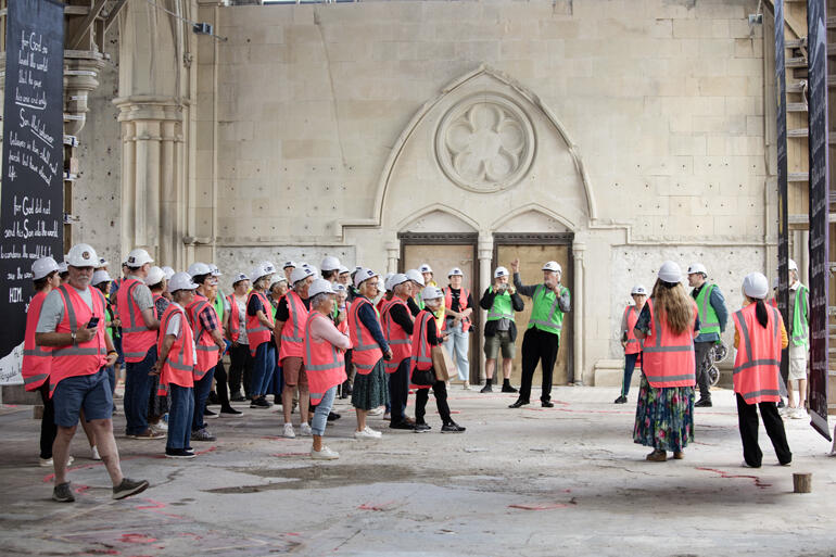 Visitors to the Christ Church Cathedral explore its partially restored interior with Dean Ben & Pete Majendie.