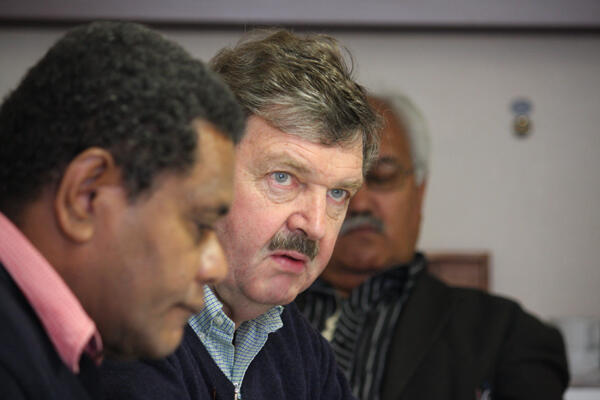 Charles Waldegrave speaks at the men's caucus - that's George Kiriau, the secretary for the Province of Melanesia, in the foreground.