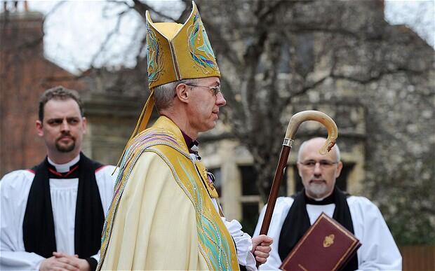 Archbishop Welby arrives at the west door of Canterbury Cathedral.  Photo: EPA