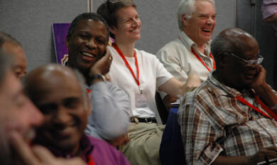 Dr Tony Fitchett (right rear), lay representative for this church, enjoys a joke at the ACC meeting in Jamaica.