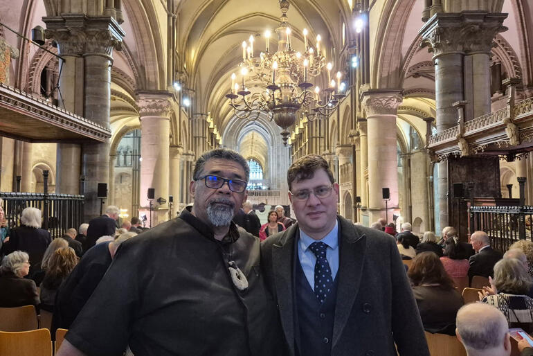 Fe'iloakitau Kaho Tevi pauses for a photo with Exec. Director of the Anglican Alliance Robert Dawes