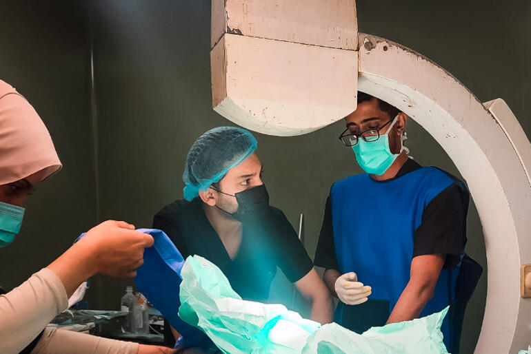 Medical staff work in the surgical ward at Al Ahli Hospital in Gaza. Medical staff work in the surgical ward at Al Ahli Hospital in Gaza.