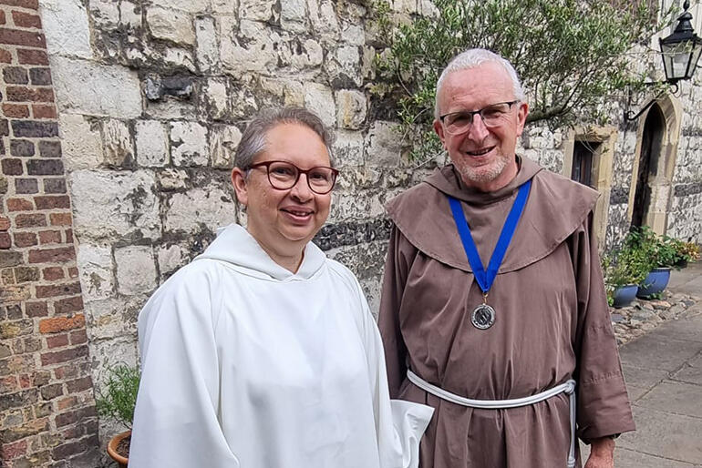 Brother Christopher John SSF grabs a picture with Sister Pascale of the Chemin Neuf community at Lambeth Palace this week. Brother Christopher John SSF grabs a picture with Sister Pascale of the Chemin Neuf community at Lambeth Palace this week.