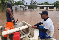 Building climate resilience: local responders search flooded neighbourhoods following Cyclone Ana. Building climate resilience: local responders search flooded neighbourhoods following Cyclone Ana.