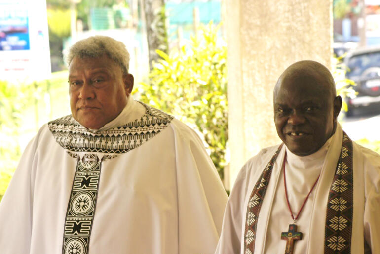 Archbishop Fereimi Cama and Archbishop of York John Sentamu enter Holy Trinity Cathedral on the first leg of Archbishop John's tour of this Province.