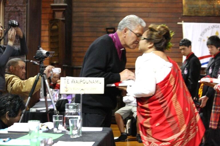 Sandi Padeken, from the Diocese of Hawaii, spoke, sang, played the ukelele, danced - and gave gifts to our bishops.