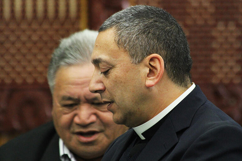 Katene standing beside his uncle Te Ramaroa Eruera, who spoke first for the visitors.