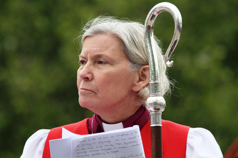 Bishop Victoria Matthews reflects during the deconsecration service. She challenged her listeners to be "a pilgrim people."