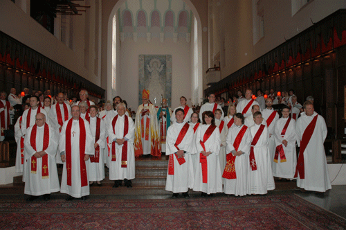 Newly ordained are presented to the congregation, who react with wild applause. Photo/Jay Berryman Newly ordained are presented to the congregation, who react with wild applause. Photo/Jay Berryman