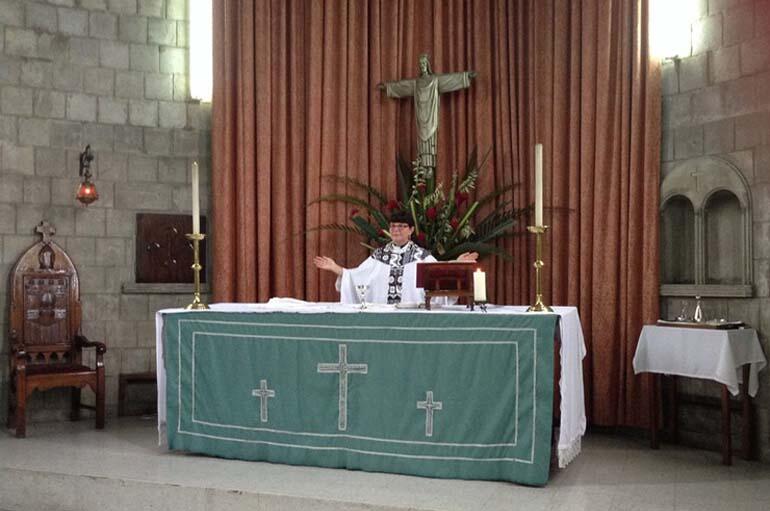Archdeacon Carol Hughes celebrating at a service of remembrance for Dean Lynda Patterson in Holy Trinity Cathedral, Suva.