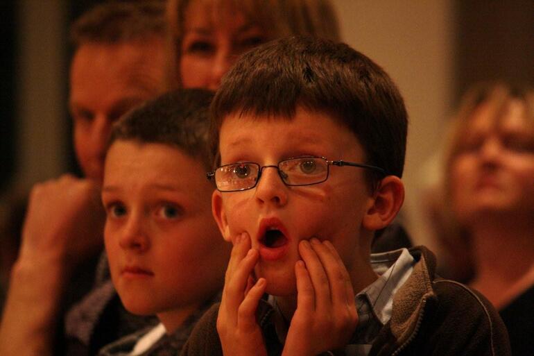 Young Nathan Kelly-Moore responds to one of the more dramatic moments of his mum's installation as dean.