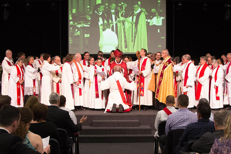 The Rev Michael Brantley being ordained to the priesthood. 