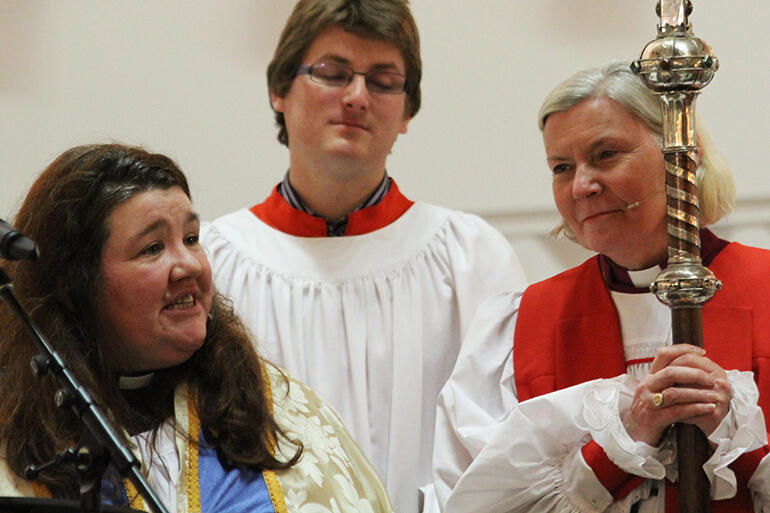 Lynda speaks at the September opening service of the cathedral of which she is now formally Dean - and Bishop Victoria looks on.