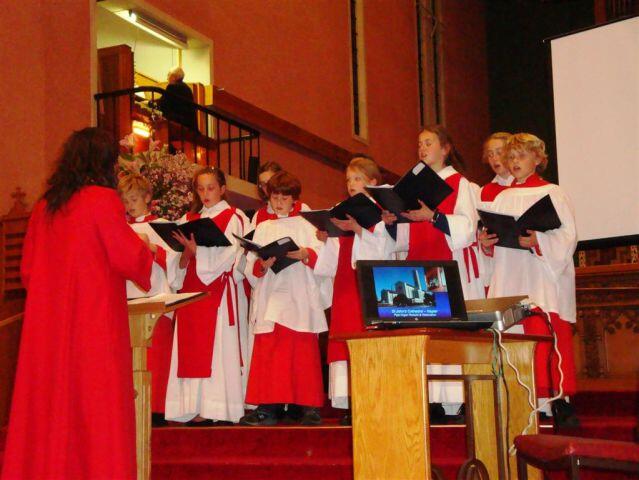 The Waiapu Cathedral Choristers sing at the signing of the organ contract.