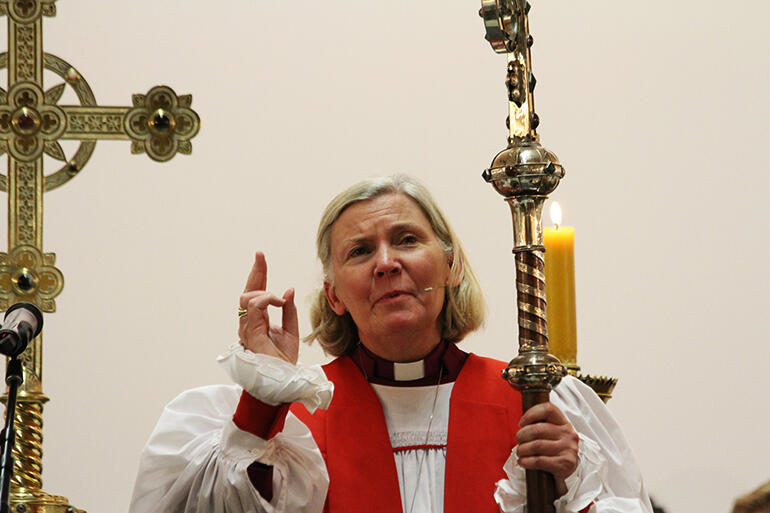 Bishop Victoria Matthews declares her blessing.