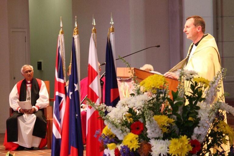 The Very Rev Ross Bay welcomes mourners to the national tsunami memorial service, held in the cathedral on November 8.