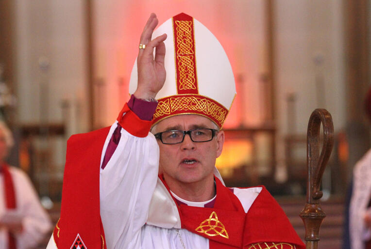 The new Assistant Bishop of the Anglican Diocese of Auckland, Jim White, gives the blessing after his ordination service.