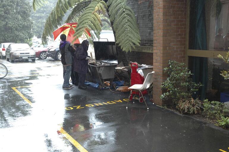 Despite the rain, people still had to eat during Wellington's sesqui.