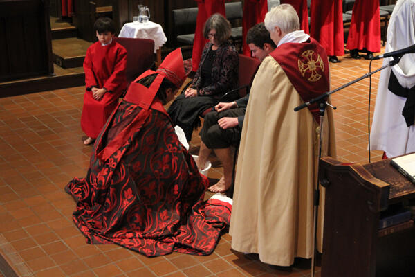 Justin's first act as bishop was to wash the feet of three members of the congregation. The symbolism was clear.