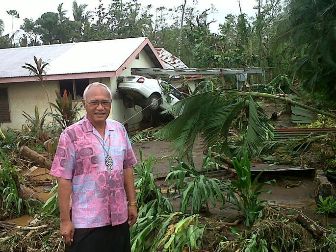 Archbishop Winston Halapua surveys the wreckage of Cyclone Evan in Apia prior to Christmas.